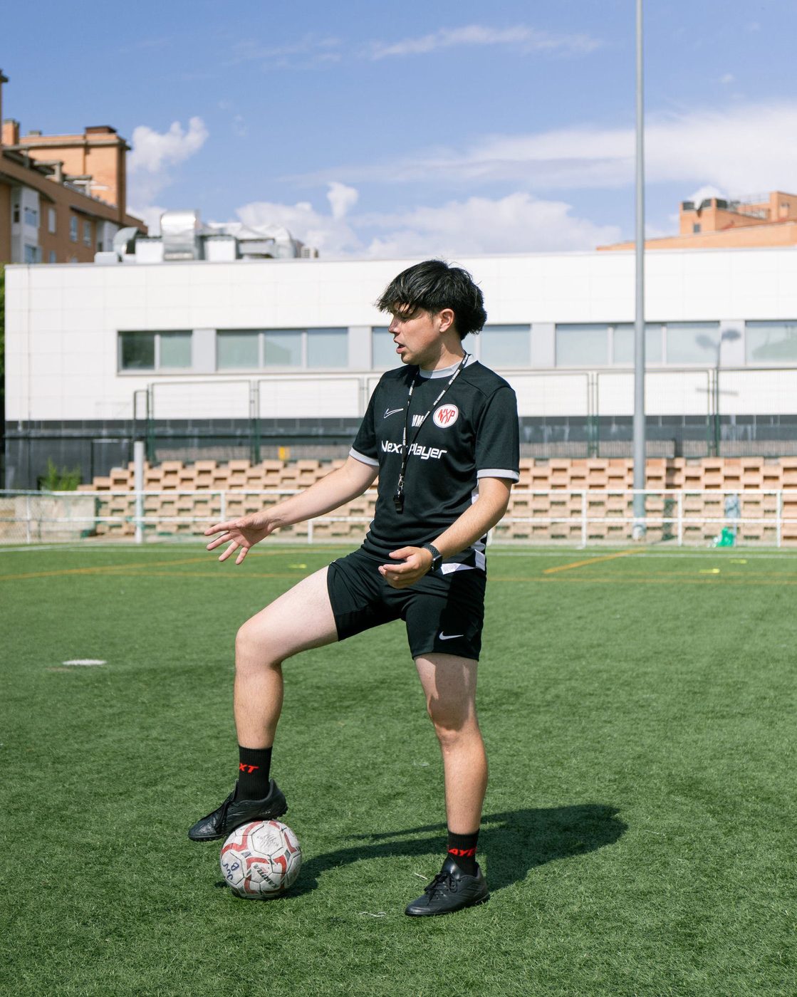 Entrenador Next Player con balón